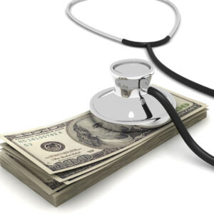 Stack of Money with Stethoscope